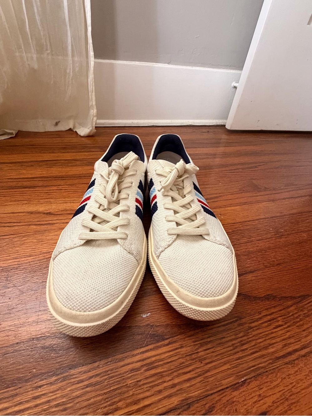 Rothy's Cream Sneakers with Navy & Red Stripe Accents